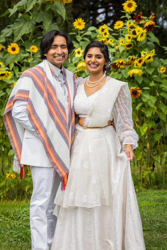 Bride and groom with sunflowers, Rustic farm wedding at Five Birds Farm, Ringoes, NJ