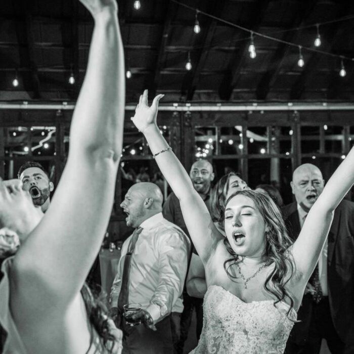 people dancing at a wedding